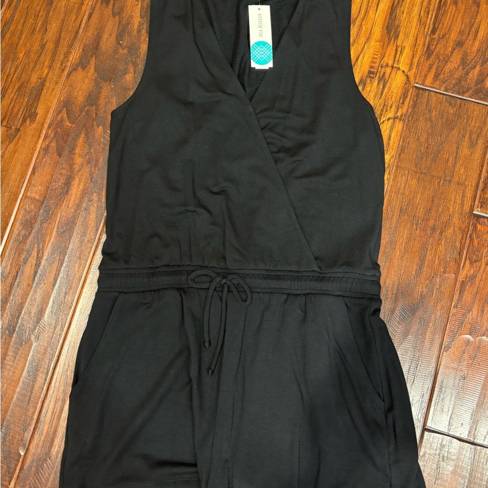 Beyond Yoga Black Jumpsuit with Deep V-Neckline and Adjustable Waist